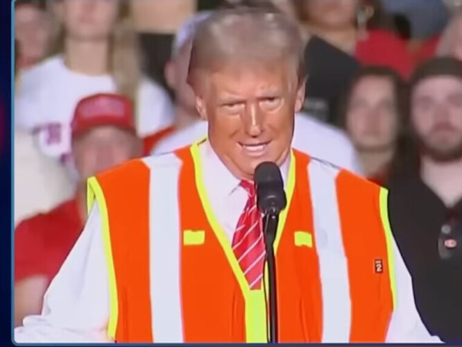 Trump trying on orange in preparation for his prison jumpsuit